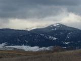 Grey Clouds, Snowy Hills