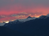 Sunset Glowing behind the Mountains