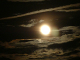 Full Moon in a Sea of Clouds