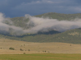 Cloud weaving through Mountains