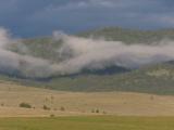 Cloud weaving through Mountains