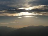 Sun behind a Band of Clouds