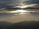 Sun behind a Band of Clouds