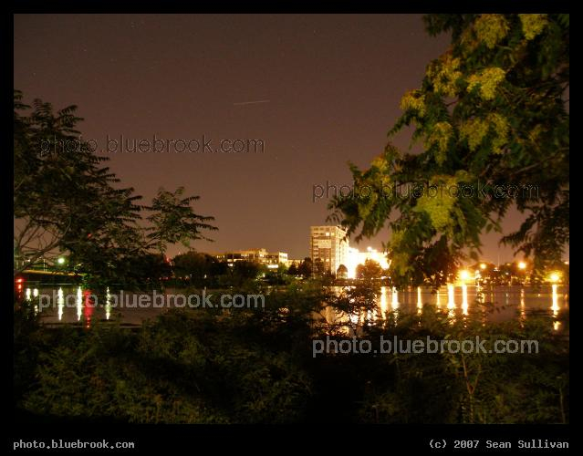 Endeavour/ISS in the North - Motion through space of the docked Space Station and Shuttle Endeavour (STS-118) makes a line over the Mystic River (8 second exposure)