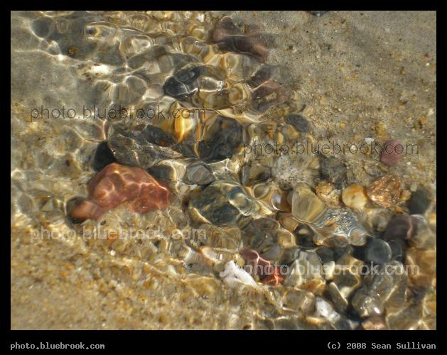 Stones Underwater - Pebbles on Revere Beach in a temporary channel formed after high tide, Revere MA