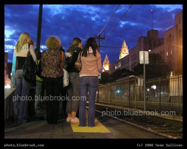 Waiting at BU East - A crowd of people waiting for the inbound Green Line streetcar at Boston University East station, Boston MA