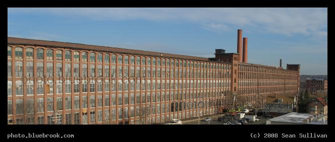 Horizontal Skyscraper - A third of a mile long, covering nearly 30 acres, once the largest woolen mill in the world.  Now known as the 'Monarch on the Merrimack' residential building.  Lawrence, MA