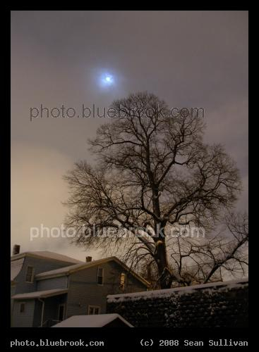 Full Winter Moon - The full moon through clouds on a winter night, Somerville MA