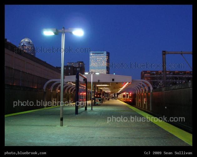 Southwest Corridor in Twilight - A northbound Orange Line MBTA subway train departing Massachusetts Ave station, Boston MA