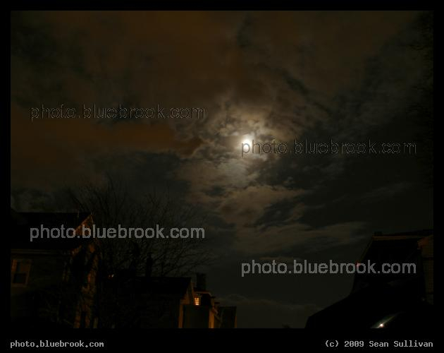 Penumbra - A long exposure showing the moon and clouds during the penumbral phase of the March 2007 lunar eclipse, as the moon emerges from the Earth's shadow.  Somerville, MA
