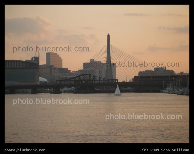 Boston Harbor near Sunset - From a ferry in Boston Harbor near sunset, looking towards the Boston Garden (left), I-93 Zakim Bridge (back) and Charlestown Bridge (front).