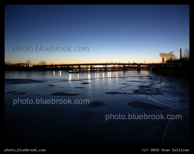 Dawn over Ice - Morning twilight over the frozen Mystic River, looking towards the MBTA Orange Line bridge from the Mystic River Reservation, Somerville MA