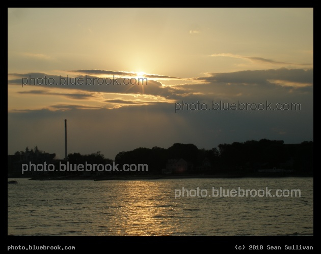 Peeking Sun over Quincy - From Boston Harbor, looking towards Quincy MA