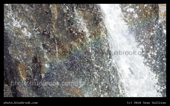 Froth, with Rainbow - The falling water of the Cascades waterfall produces a rainbow in the afternoon sunlight.   Middlesex Fells Reservation, Melrose MA