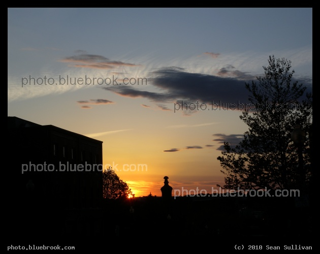 Charlestown Sunset - The setting sun peeking through the treeline, Charlestown MA