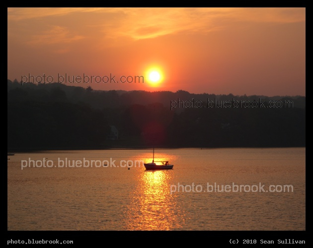 Boat on Upper Mystic Lake - At sunset.  Winchester, MA