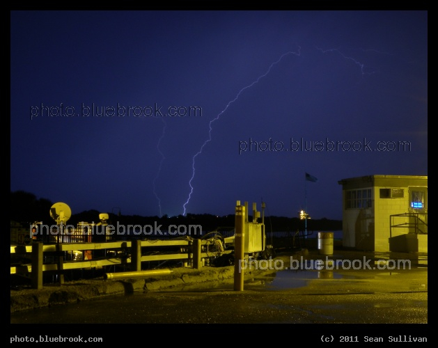 Lightning over Pad 39-A - View from the Kennedy Space Center press site towards launch pad 39-A as a front moved across central Florida