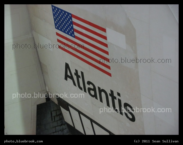 Wing Markings - Space shuttle Atlantis vertical in the transfer aisle of the Vehicle Assembly Building during preparations for the last shuttle flight (STS-135), Kennedy Space Center FL