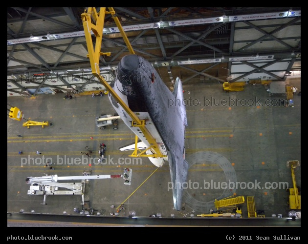 Above the Transfer Aisle - Space shuttle Atlantis vertical in the transfer aisle of the Vehicle Assembly Building during preparations for the last shuttle flight (STS-135), Kennedy Space Center FL
