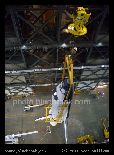Atlantis Raised - Space shuttle Atlantis vertical in the transfer aisle of the Vehicle Assembly Building during preparations for the last shuttle flight (STS-135), Kennedy Space Center FL