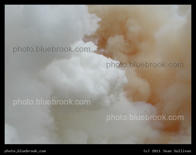 After Liftoff - Exhaust clouds after the final space shuttle launch - white from the main engines, orange from the solid rocket boosters