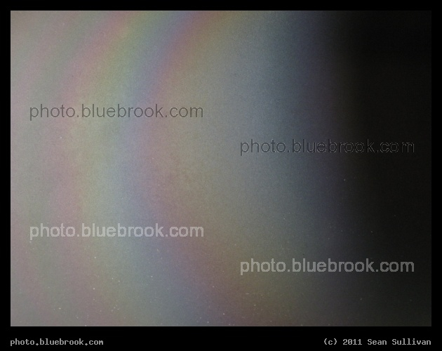 Dragon Rainbow - Close-up view of coloration on a surface element of the first-flown SpaceX Dragon space capsule, Cape Canaveral FL