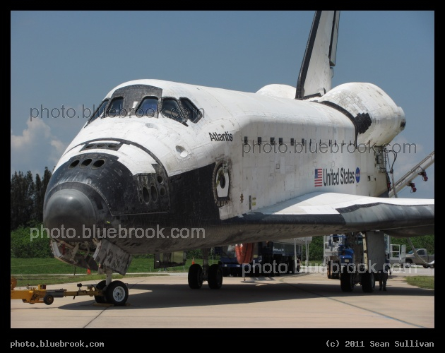 Earthbound - Space shuttle Atlantis, hours after its landing at the conclusion of the space shuttle program, on display outside the Orbiter Processing Facility at the Kennedy Space Center