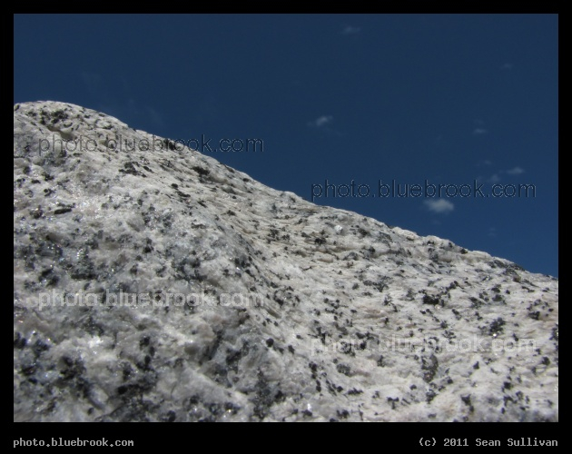 Micromountain - Detail of a granite rock used in a flood barrier along the Red Lake River, Crookston MN
