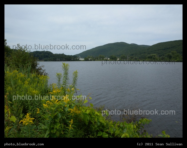 Vernon Street Vista - Water alongside Vernon Street in Brattleboro VT, with a view to mountains in New Hampshire on the far side of the Connecticut River
