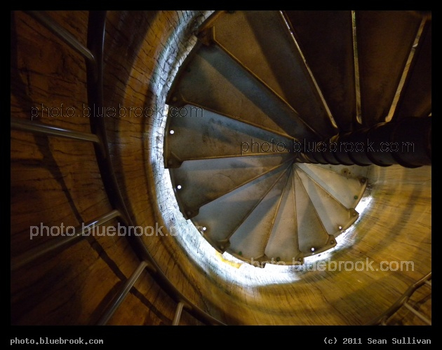 Nautilus Staircase - Looking up at a spiral staircase in the Rainforest exhibit at the Cleveland Metroparks Zoo, Cleveland OH