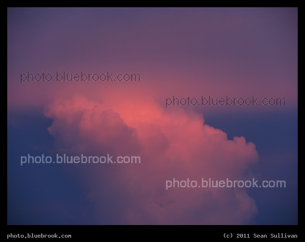 Pink Tower - Storm clouds at sunset to the southeast, lit by the final rays of the day, from the Kennedy Space Center press site, Cape Canaveral FL