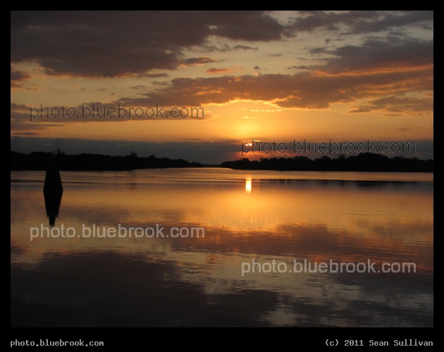 Sunrise Reflection - Sunrise from the Kennedy Space Center Press Site, FL