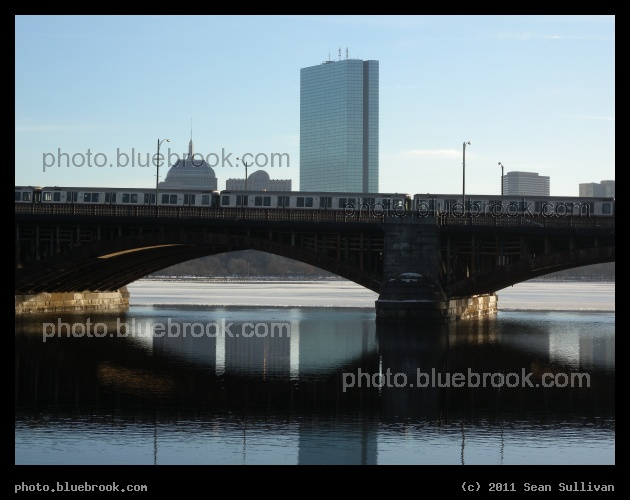Skyscraper, Train and Bridge - MBTA Red Line train crossing the Longfellow Bridge over the Charles River, with Boston