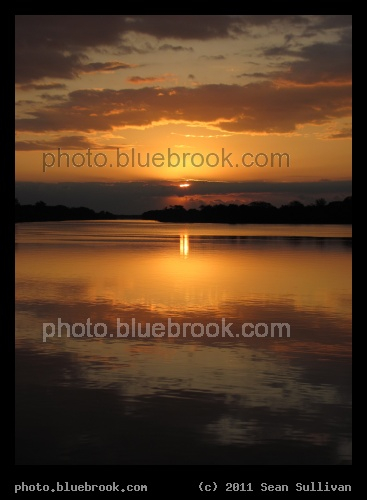 Glimmer of Sunlight - Sunrise from the Kennedy Space Center Press Site, FL