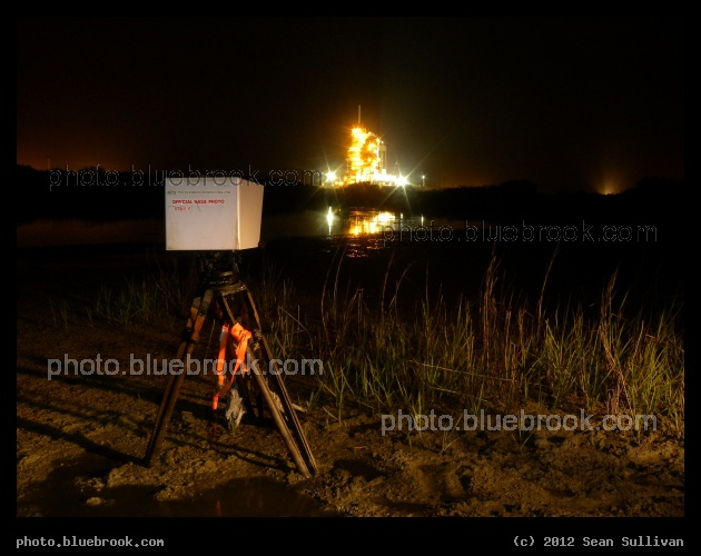 Official Camera - An official NASA remote camera southwest of Kennedy Space Center launch pad 39-A, hours after the final launch of space shuttle Discovery.  Foreground lighting provided by photographer Roger Scruggs.