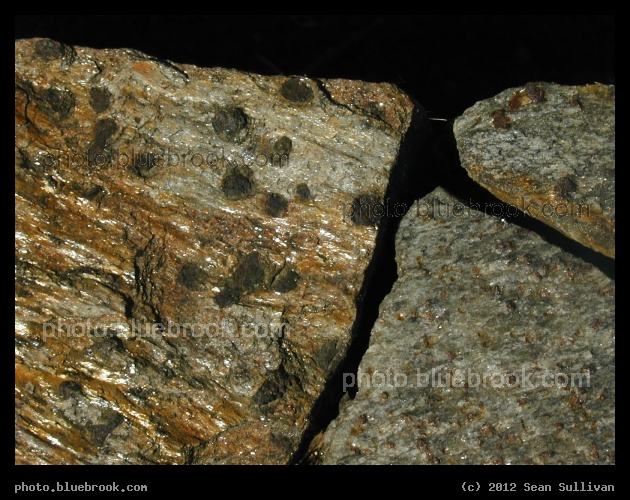 Schist Landscaping - Decorative rocks used in a retaining wall for a planter, Amherst College, Amherst MA