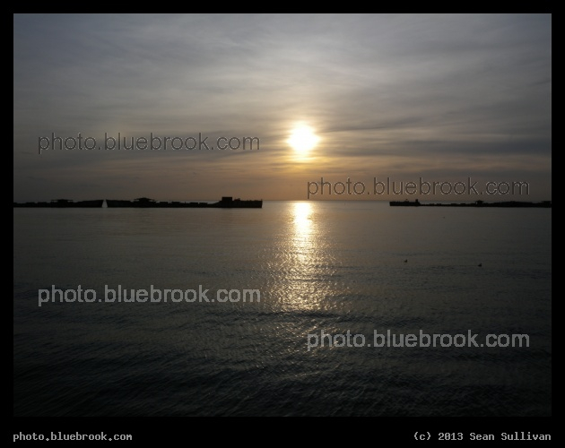 Kiptopeke Breakwater - Sunset behind a breakwater formed by partially sunken concrete ships, Kiptopeke State Park, Virginia