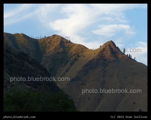Sentinels of Dawn - Sunrise touching mountaintops above Riggins, ID