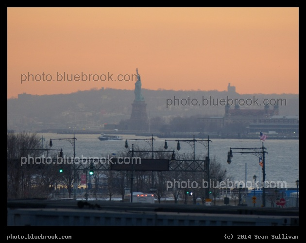 New York Sunset - Statue of Liberty at sunset from the High Line, New York City