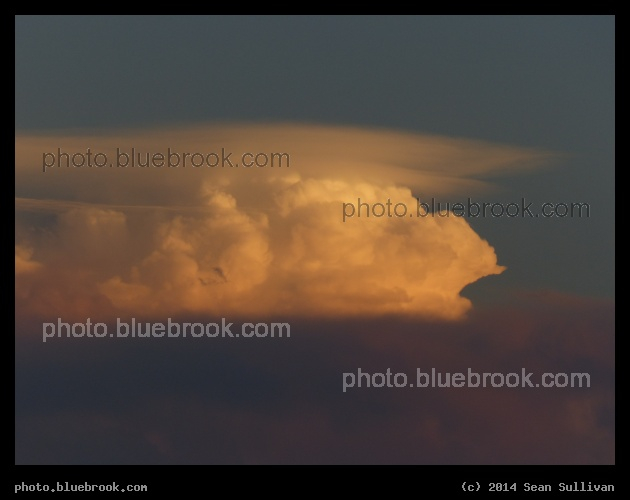 Shadow Rising - Clouds at sunset, with the tops still in sunlight, Sarasota FL