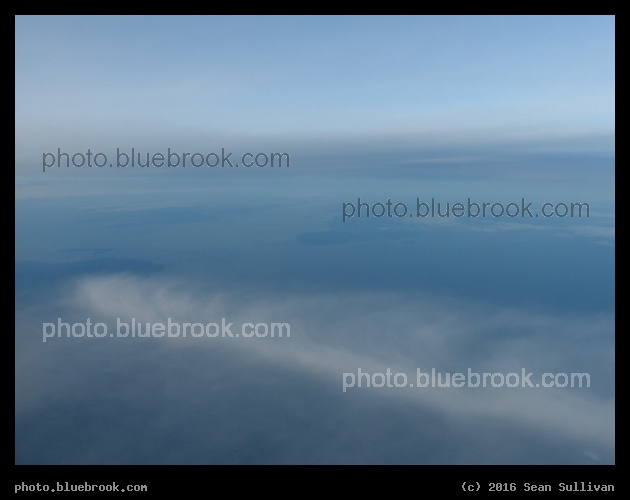 Soft Sky - View from airplane over the channel between northernmost Northern Ireland (left) including Rathlin Island and the Kintyre Peninsula of Scotland (right)
