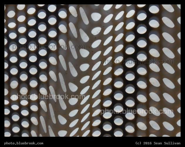 Antishadows of Circles - Shadows on a construction cover at MBTA Salem Station, Salem MA