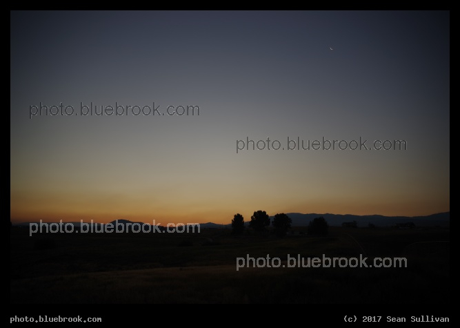 77 Hours - Waning crescent moon over the Sapphire Mountains, 77 hours before the 2017 solar eclipse