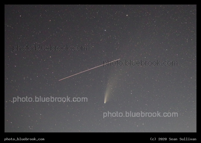 Conjunction of Satellite and Comet - 30 second exposure showing the motion of the International Space Station against the tail of comet NEOWISE, Corvallis MT