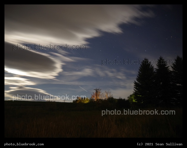 Two Spacecraft - 20 second exposure of ISS (bright, below) and Inspiration 4 (faint, above) with moonlit clouds, Corvallis MT