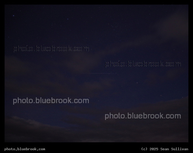 Polar Dragon - Time exposure (20 seconds) showing orbital motion of the Fram 2 flight of the Dragon spacecraft Resiliance, on the first manned flight in a polar orbit.  Background stars are in the area of Coma Berenices and Bootes, the bright star to the lower-right of the track is Vindemiatrix.