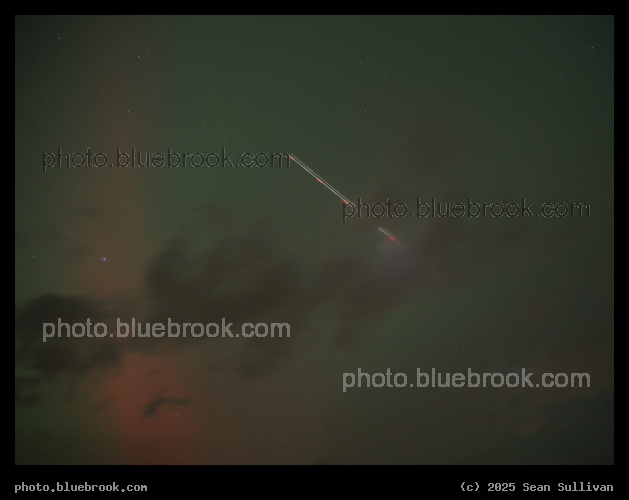 Flight into Clouds - Time exposure of an airplane flying into low clouds below an aurora, Corvallis MT