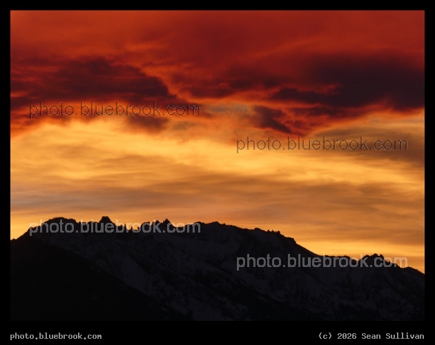Orange Clouds over Jagged Peaks - Corvallis MT