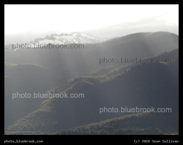 Light Glancing over a Mountainside - Corvallis MT